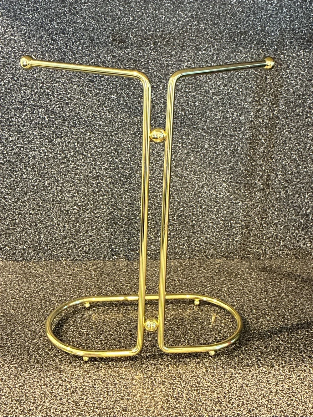 Vintage gold-tone metal countertop vanity hand towel stand